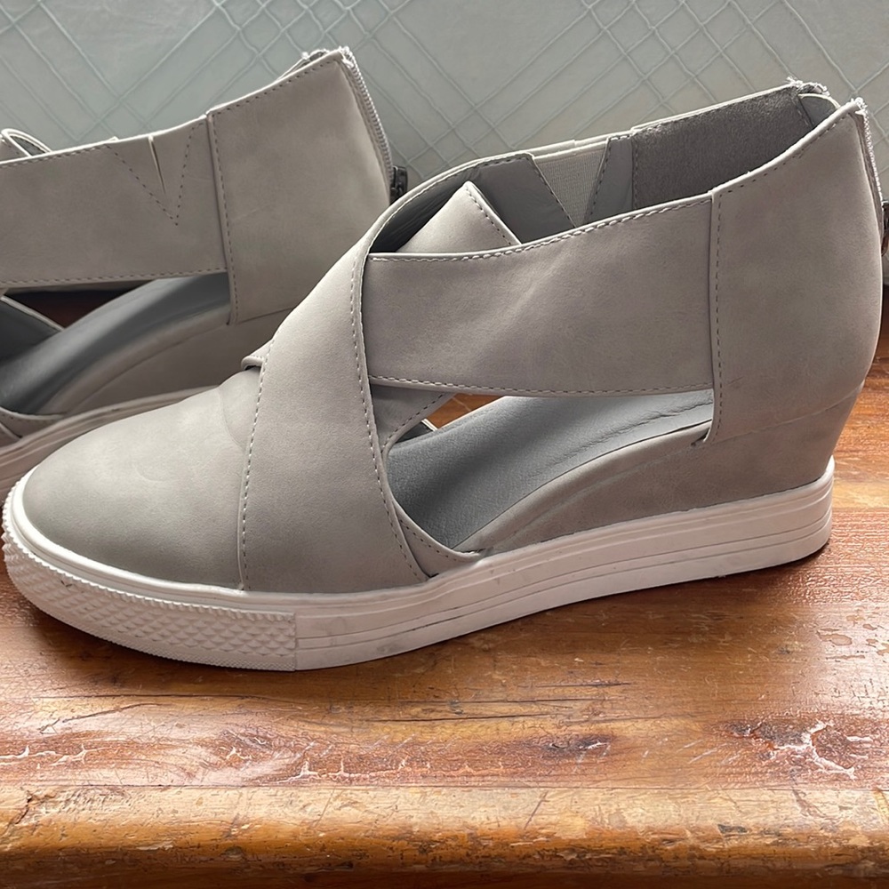Wicked cute wedge cut out sneaker. No name brand from little shop.